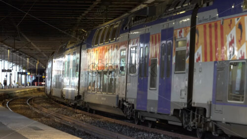Cannes, France – July 2, 2025: Regional train in Provence-Alpes-Cote d’Azur departing from a French railway station - Starpik Stock