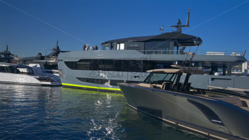 Cannes, France – June 22, 2025: Multiple boats docked in the Cannes harbour in daylight - Starpik Stock