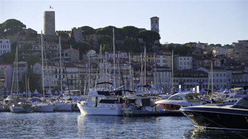 Cannes, France – June 22, 2025: Multiple boats docked in the Cannes harbour in daylight - Starpik Stock