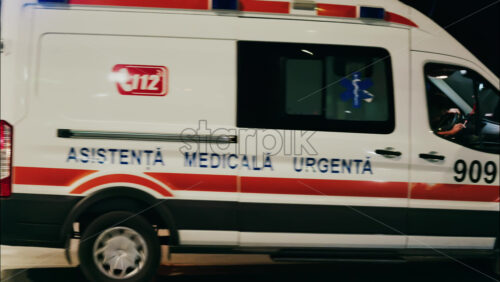Chisinau, Moldova – June 12, 2025: Ambulance rushing on the streets of the city center in the evening - Starpik Stock