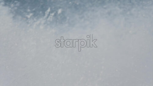 Chisinau, Moldova – June 17, 2025: A man in a black life vest riding a black jet ski at high speed across a calm body of water - Starpik Stock