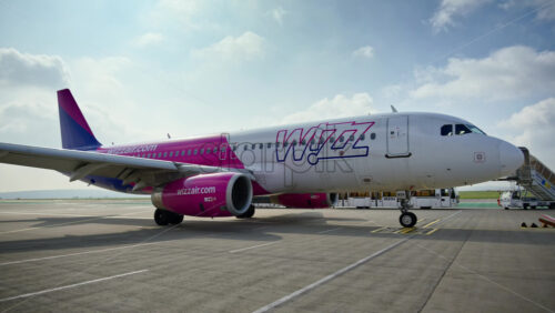 Chisinau, Moldova – March 20, 2025: View of a white WizzAir airplane at the Chisinau International Airport - Starpik Stock