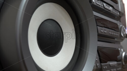 Close up of a speaker of a big, grey boombox - Starpik Stock