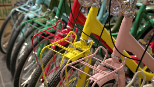 Close up of colourful bicycles parked in a store - Starpik Stock