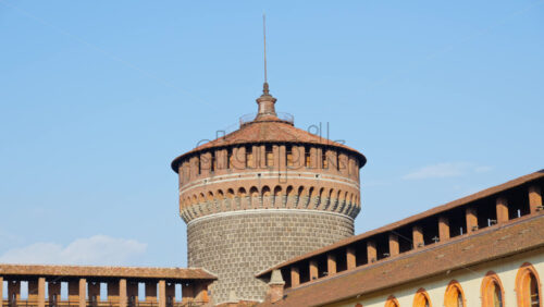 Close up of the Sforzesco Castle over a blue sky in daylight - Starpik Stock