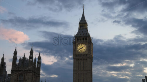 Close-up view of Big Ben illuminated at dusk in London, England - Starpik Stock