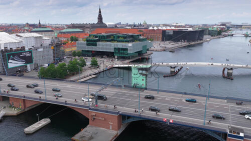 Copenhagen, Denmark – August 4, 2025: Aerial drone view of Langebro Bridge and BLOX cultural center in Copenhagen, Denmark - Starpik Stock