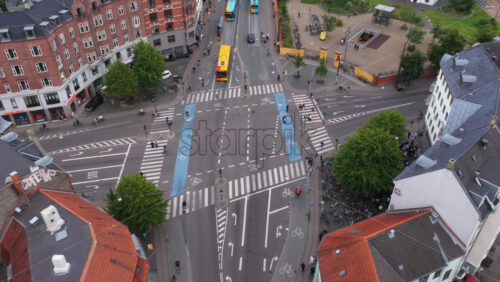 Copenhagen, Denmark – August 4, 2025: Aerial drone view of Norrebrogade, one of the busiest streets in Norrebro, looking towards the city center skyline - Starpik Stock