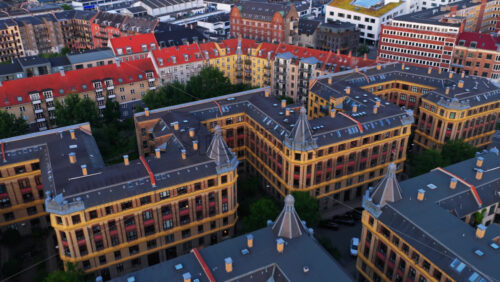 Copenhagen, Denmark – August 4, 2025: Aerial drone view of historic apartment blocks in Vesterbro, Copenhagen, Denmark - Starpik Stock
