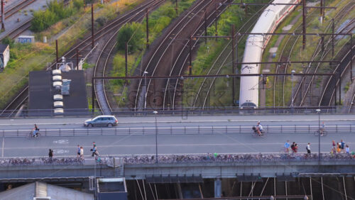 Copenhagen, Denmark – August 4, 2025: Aerial drone view of intercity trains and S-trains in the rail yard near Copenhagen Central Station - Starpik Stock
