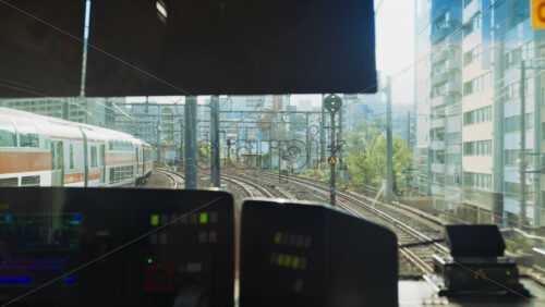 Kyoto, Japan – April 11, 2025: View from a moving train driver cabin window and the rails in Tokyo, Japan - Starpik Stock