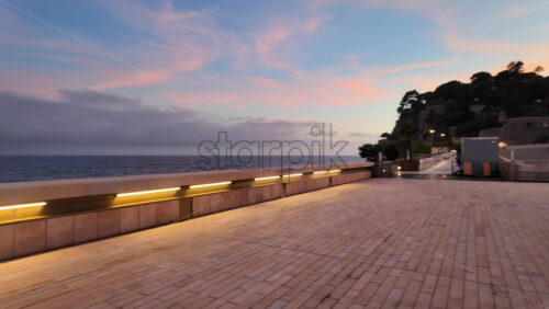La Condamine, Monaco – July 18, 2025: Packed harbour of yachts against dense hillside apartments under grey clouds - Starpik Stock
