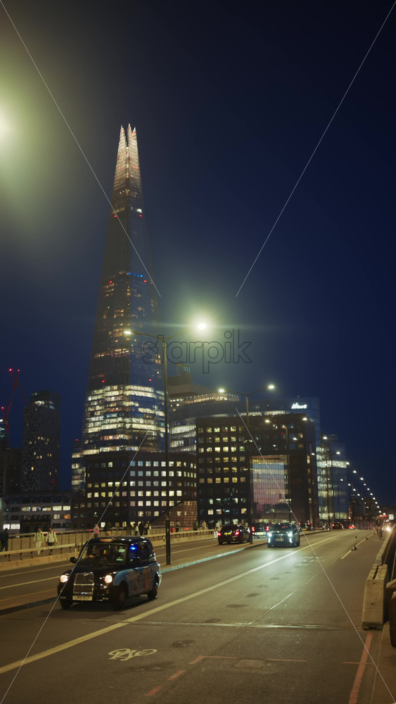 London, England – May 12, 2025: Cityscape view showing modern skyscrapers. Vertical - Starpik Stock
