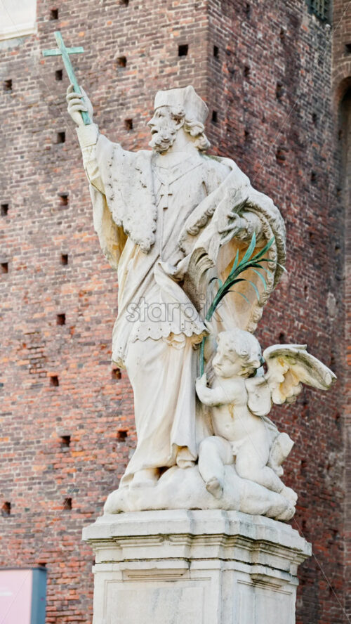 Milan, Italy – March 20, 2025: Monument to san Giovanni Nepomuceno at the Sforzesco Castle in daylight. Vertical - Starpik Stock