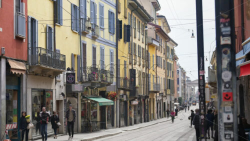 Milan, Italy – March 20, 2025: People walking on the streets of the city in daylight - Starpik Stock