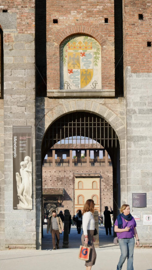 Milan, Italy – March 20, 2025: The seal above the entrance of the Sforzesco Castle in daylight. Vertical - Starpik Stock