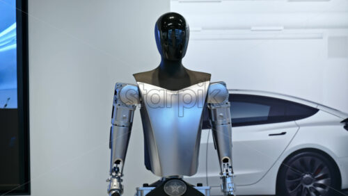 Milan, Italy – March 21, 2025: Close up of a Tesla Bot, robotic humanoid, displayed at the showroom - Starpik Stock