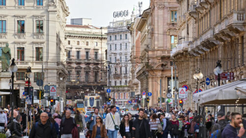 Milan, Italy – March 21, 2025: People walking on the streets of the city in daylight - Starpik Stock
