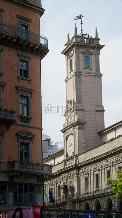 Milan, Italy – March 21, 2025: View of the buildings in the city in daylight. Vertical - Starpik Stock