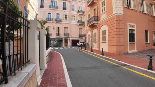 Monaco City, Monaco – July 18, 2025: A stroll along the scenic pedestrian path on a charming narrow street in the city - Starpik Stock