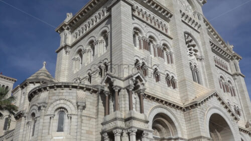 Monaco City, Monaco – July 4, 2025: View of the facade of the Cathedral of Our Lady Immaculate under the blue sky - Starpik Stock