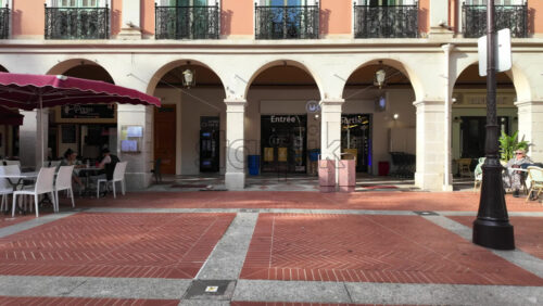 Monte Carlo, Monaco – July 18, 2025: People walking through the court of the Prince’s Palace of Monaco - Starpik Stock