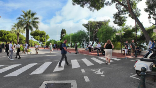 Monte Carlo, Monaco – July 18, 2025: People walking through the court of the Prince’s Palace of Monaco - Starpik Stock