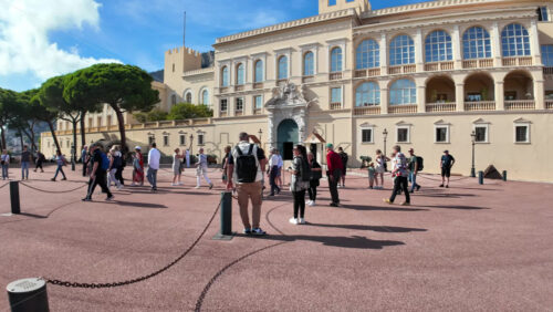 Monte Carlo, Monaco – July 18, 2025: People walking through the court of the Prince’s Palace of Monaco - Starpik Stock