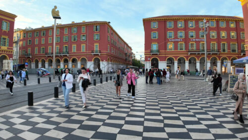 Nice, France – August 15, 2025: People walking through Place Massena in daylight - Starpik Stock