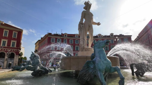 Nice, France – July 19, 2025: People walking through Place Massena in daylight - Starpik Stock