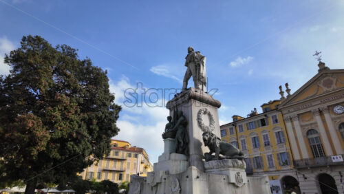 Nice, France – July 19, 2025: Statue of Giuseppe Garibaldi with two bronze lions at the base, in Place Garibaldi - Starpik Stock