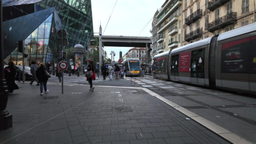 Nice, France – July 20, 2025: People walking on the streets of the city on a sunny day - Starpik Stock