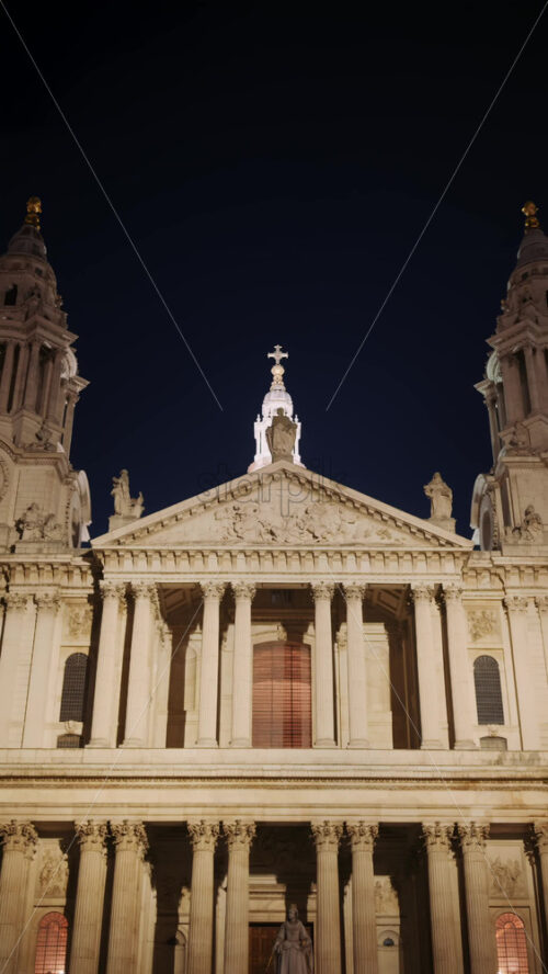 The Dome of St. Paul’s Cathedral trees with the night sky in the background in London, England. Vertical - Starpik Stock
