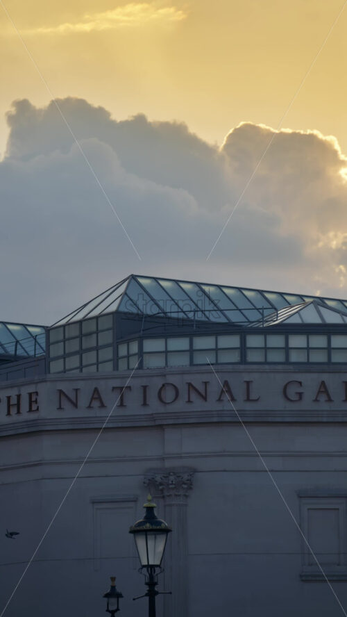The National Gallery museum in London, England under dramatic clouds. Vertical - Starpik Stock