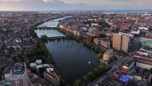 Video – Copenhagen, Denmark – August 3, 2025: Aerial drone view of the Lakes curving around the western margin of the city centre - Starpik Stock