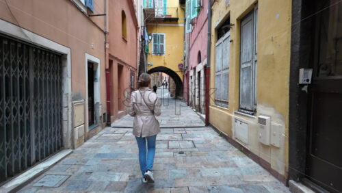 Villefranche-sur-Mer, France – July 18, 2025: View of the streets of the city lined with colourful buildings - Starpik Stock