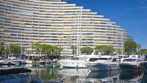Villeneuve-Loubet, France – June 7, 2025: Boats docked in the Marina Baie des Anges in daylight - Starpik Stock