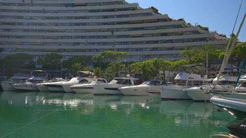 Villeneuve-Loubet, France – June 7, 2025: Boats docked in the Marina Baie des Anges in daylight - Starpik Stock