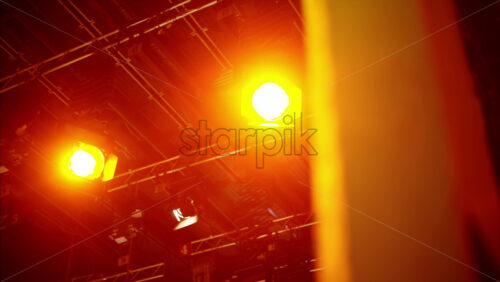 Video - Flashing studio lights equipment on the ceiling of a TV set