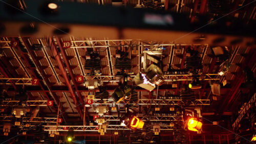 Video - Flashing studio lights equipment on the ceiling of a TV set