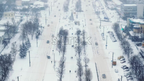 Video - Aerial drone view of the city covered in snow. Winter in Chisinau, Moldova