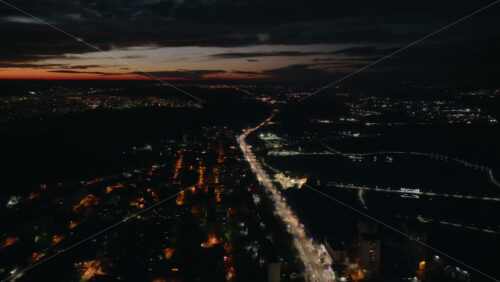 Video - Aerial drone view of Chisinau city at night, blue hour. Moldova