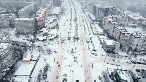 Video - Aerial drone view of the city covered in snow. Winter in Chisinau, Moldova