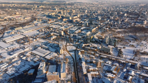 Video - Aerial drone view of the city covered in snow. Sunrise during winter in Chisinau, Moldova