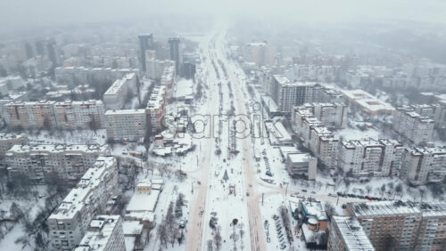 Video - Aerial drone view of the city covered in snow. Winter in Chisinau, Moldova