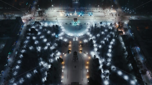 Video - Aerial drone view of Chisinau center city covered in snow. Cathedral and Government building at night. Moldova