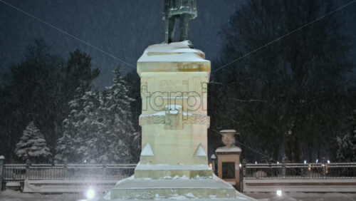Video - Stephen the Great monument during a snowfall. Blue hour. Winter evening in Chisinau, Moldova
