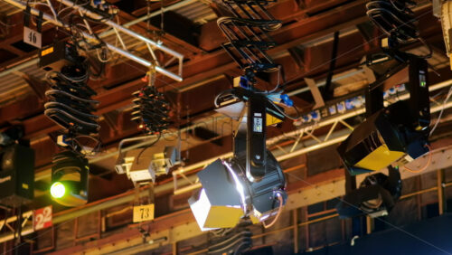 Video - Flashing studio lights equipment on the ceiling of a TV set