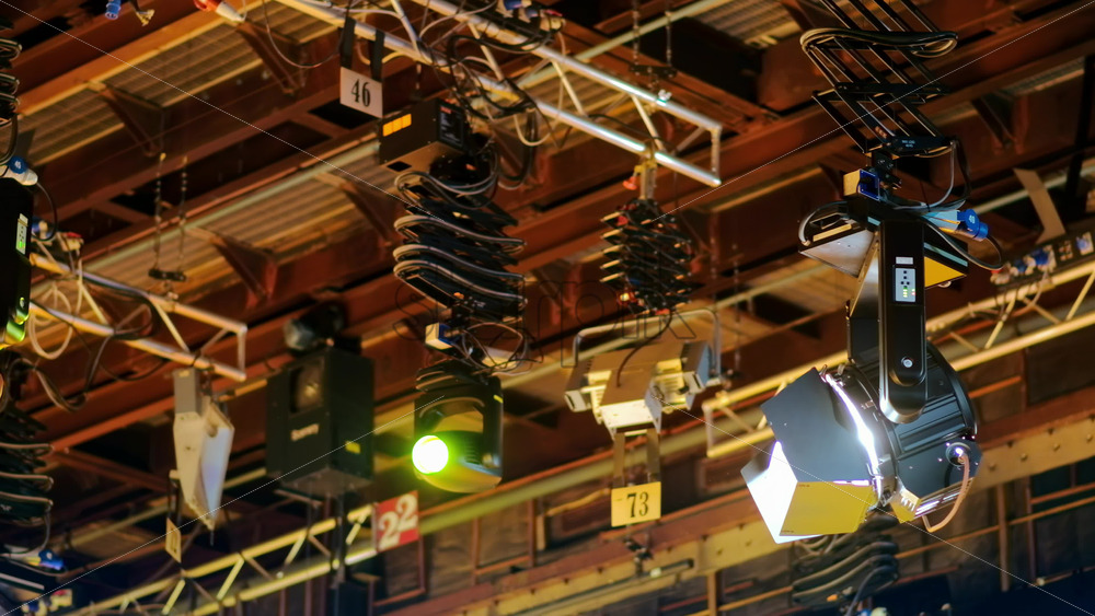 Video - Flashing studio lights equipment on the ceiling of a TV set