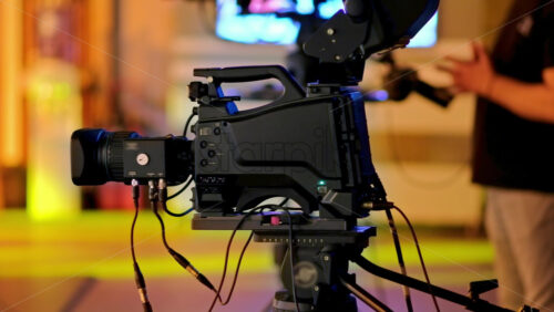 Video - Professional camera filming with on the backstage of a TV set